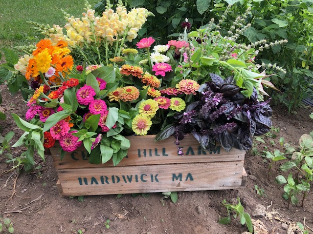 crate of flower arrangements
